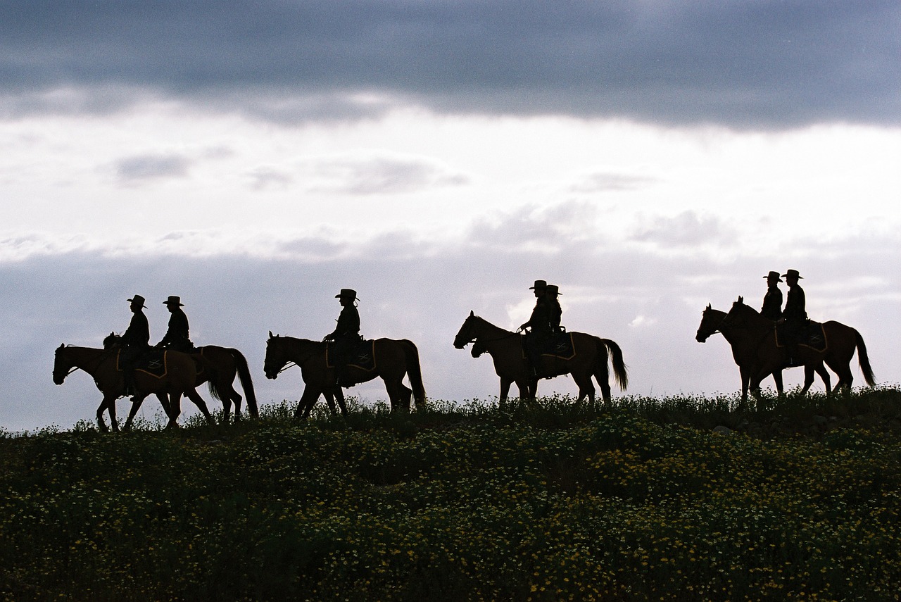 Men riding horses through Texas